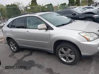 2006 Lexus RX 400h with VIN JTJHW31U060023031, listed as a IAAI auction lot 42070961 with 212,816 mi miles and . Bid and sale history available at DreamBid. Image 13.