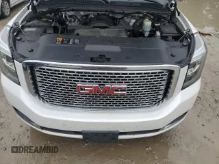 2016 GMC Yukon XL Denali with VIN 1GKS2HKJXGR421600, listed as a Copart auction lot 66868064 with 159,013 mi miles and Salvage Title. Bid and sale history available at carsss.com. Image 12.