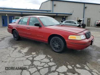 1999 Ford Crown Victoria Police with VIN 2FAFP71W7XX167653, listed as a Copart auction lot 54241955 with 81,967 mi miles and Salvage Title. Bid and sale history available at carsss.com. Image 4.