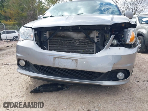 2017 Dodge Grand Caravan SXT with VIN 2C4RDGCG6HR671199, listed as a IAAI auction lot 42031157 with 99,189 mi miles and . Bid and sale history available at DreamBid. Image 20.
