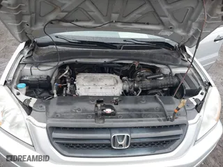 2004 Honda Pilot EX with VIN 2HKYF18534H617991, listed as a IAAI auction lot 41855906 with 193,084 mi miles. Bid and sale history available at carsss.com. Image 10.
