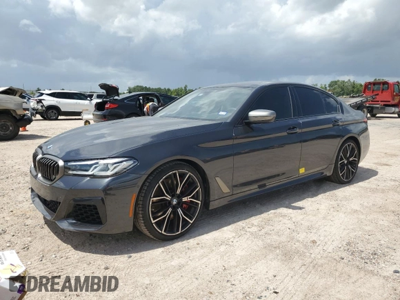 2022 BMW 5 Series M550i xDrive z VIN WBA13BK09NCJ00508, wystawiony jako Copart lot #58077634 z przebiegiem Nie podano mil oraz . Historia ofert i sprzedaży dostępna na DreamBid. Obrazek 1.