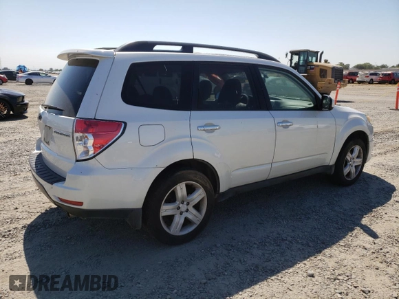2009 Subaru Forester X with VIN JF2SH63679H777246, listed as a Copart auction lot 64516665 with 183,400 mi miles and Salvage title. Bid and sale history available at DreamBid. Image 3.