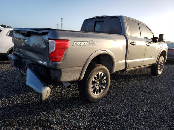 2019 Nissan Titan XD SV with VIN 1N6BA1F4XKN532266, listed as a Copart auction lot 77098244 with 105,965 mi miles and Salvage Title. Bid and sale history available at carsss.com. Image 3.