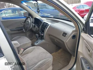2006 Hyundai Tucson GLS with VIN KM8JN12D46U352491, listed as a IAAI auction lot 41749563 with 151,930 mi miles. Bid and sale history available at carsss.com. Image 5.