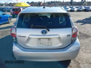 2014 Toyota Prius One z VIN JTDKDTB32E1574607, wystawiony jako IAAI lot #41724312 z przebiegiem 102 612 mil mil oraz . Historia ofert i sprzedaży dostępna na DreamBid. Obrazek 16.