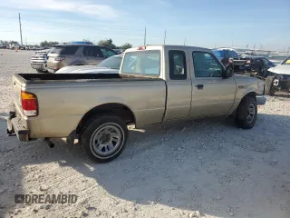 1999 Ford Ranger XLT with VIN 1FTYR14X1XPB75400, listed as a Copart auction lot 80879084 with 255,136 mi miles and Salvage Title. Bid and sale history available at DreamBid. Image 3.
