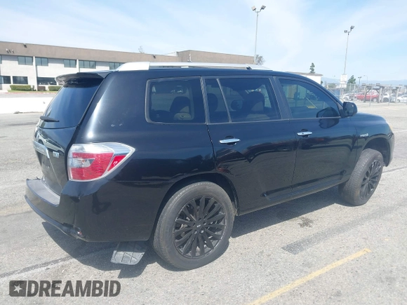 2009 Toyota Highlander Hybrid with VIN JTEEW41A592026819, listed as a IAAI auction lot 41837703 with 216,588 mi miles. Bid and sale history available at carsss.com. Image 4.