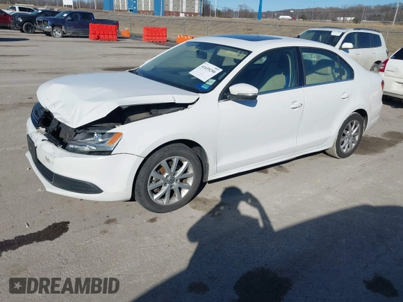 2013 Volkswagen Jetta SE with VIN 3VWDX7AJ8DM424751, listed as a IAAI auction lot 41659290 with 123,408 mi miles and . Bid and sale history available at DreamBid. Image 2.