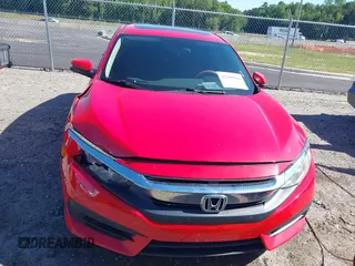 2017 Honda Civic EX z VIN 2HGFC2F77HH535613, wystawiony jako IAAI lot #42208566 z przebiegiem 121 024 mil mil oraz . Historia ofert i sprzedaży dostępna na DreamBid. Obrazek 12.