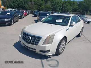 2012 Cadillac CTS Luxury with VIN 1G6DF5E50C0131857, listed as a IAAI auction lot 42610389 with 85,896 mi miles and . Bid and sale history available at DreamBid. Image 6.
