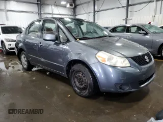 2009 Suzuki SX4 Man FWD with VIN JS2YC412496200218, listed as a Copart auction lot 46938825 with 63,909 mi miles and Salvage Title. Bid and sale history available at carsss.com. Image 4.