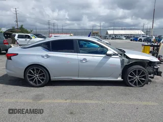 2019 Nissan Altima S z VIN 1N4BL4BVXKN313732, wystawiony jako IAAI lot #42249605 z przebiegiem 119 455 mil mil oraz . Historia ofert i sprzedaży dostępna na DreamBid. Obrazek 14.