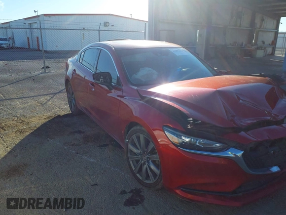 2018 Mazda Mazda6 Touring with VIN JM1GL1VM9J1317729, listed as a IAAI auction lot 41607338 with 140,832 mi miles. Bid and sale history available at carsss.com. Image 1.