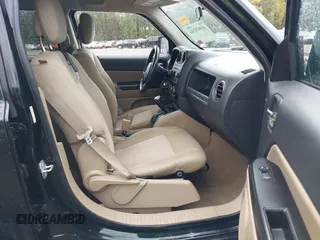 2014 Jeep Patriot Latitude with VIN 1C4NJPFA4ED650283, listed as a IAAI auction lot 41918256 with 160,598 mi miles and . Bid and sale history available at carsss.com. Image 5.