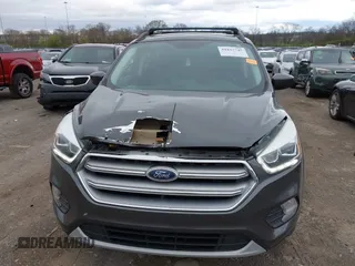 2017 Ford Escape SE with VIN 1FMCU0GD9HUE90819, listed as a IAAI auction lot 41837745 with 123,543 mi miles. Bid and sale history available at carsss.com. Image 6.