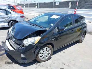 2012 Toyota Prius One z VIN JTDKDTB33C1017704, wystawiony jako IAAI lot #42227623 z przebiegiem 116 058 mil mil oraz . Historia ofert i sprzedaży dostępna na DreamBid. Obrazek 17.