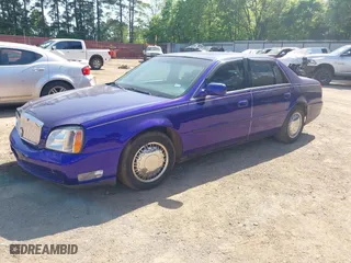 2005 Cadillac DeVille with VIN 1G6KD54Y95U214904, listed as a IAAI auction lot 42014527 with 144,207 mi miles. Bid and sale history available at carsss.com. Image 2.