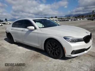 2018 BMW 7 Series 740e xDrive iPerformance with VIN WBA7J2C51JG938111, listed as a Copart auction lot 73361933 with 104,641 mi miles. Bid and sale history available at carsss.com. Image 4.