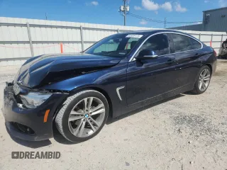 2016 BMW 4 Series 428i with VIN WBA4A9C55GG507923, listed as a Copart auction lot 65309175 with 120,100 mi miles and Salvage title. Bid and sale history available at DreamBid. Image 1.
