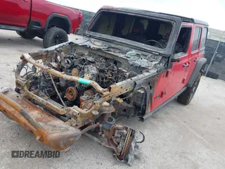 2021 Jeep Wrangler Unlimited Rubicon with VIN 1C4JJXFM1MW830218, listed as a IAAI auction lot 39934037 with Not provided miles and . Bid and sale history available at DreamBid. Image 2.