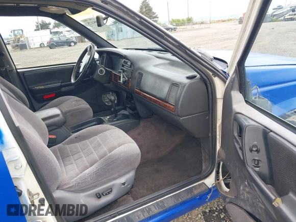 1996 Jeep Grand Cherokee Laredo with VIN 1J4GZ58YXTC329037, listed as a IAAI auction lot 42051175 with 314,571 mi miles and . Bid and sale history available at DreamBid. Image 5.