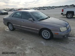 2005 Hyundai XG350 with VIN KMHFU45E65A411779, listed as a Copart auction lot 87405944 with 39,510 mi miles and Salvage Title. Bid and sale history available at carsss.com. Image 4.