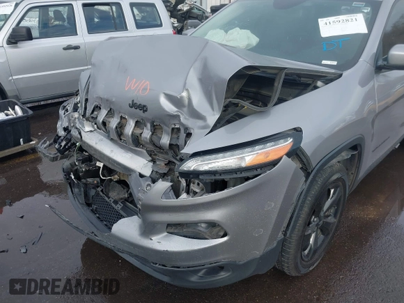 2018 Jeep Cherokee Latitude with VIN 1C4PJMCX4JD548136, listed as a IAAI auction lot 41592821 with 165,022 mi miles and . Bid and sale history available at DreamBid. Image 6.