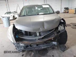 2009 Nissan Versa S with VIN 3N1BC13E59L498891, listed as a IAAI auction lot 42341967 with 156,007 mi miles and . Bid and sale history available at DreamBid. Image 12.