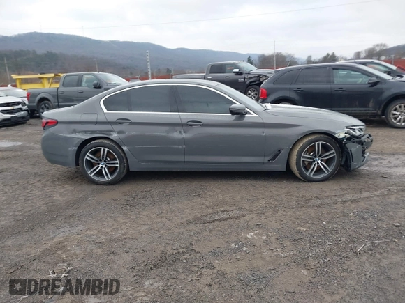 2021 BMW 5 Series 530i xDrive with VIN WBA13BJ07MWX06971, listed as a IAAI auction lot 41185018 with 52,002 mi miles and . Bid and sale history available at carsss.com. Image 14.