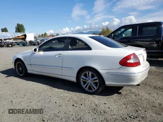 2006 Mercedes-Benz CLK-Class 3.5L with VIN WDBTJ56J16F190399, listed as a Copart auction lot 77496094 with 154,046 mi miles and Clean Title. Bid and sale history available at carsss.com. Image 2.
