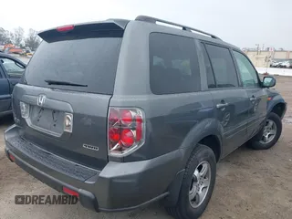 2007 Honda Pilot EX with VIN 2HKYF18497H500458, listed as a IAAI auction lot 41784273 with 114,454 mi miles. Bid and sale history available at carsss.com. Image 4.
