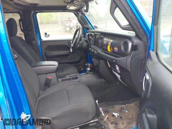 2023 Jeep Wrangler Sport with VIN 1C4HJXDG5PW530309, listed as a IAAI auction lot 42154961 with 29,846 mi miles and . Bid and sale history available at DreamBid. Image 5.