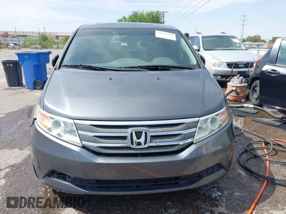 2011 Honda Odyssey EX-L with VIN 5FNRL5H68BB086943, listed as a IAAI auction lot 42503744 with 225,376 mi miles and . Bid and sale history available at DreamBid. Image 12.