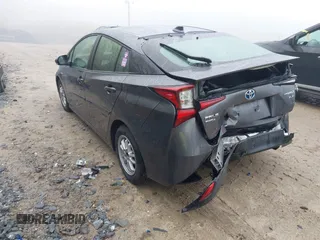 2021 Toyota Prius LE z VIN JTDL9MFU5M3023704, wystawiony jako IAAI lot #42190887 z przebiegiem 45 711 mil mil oraz . Historia ofert i sprzedaży dostępna na DreamBid. Obrazek 3.