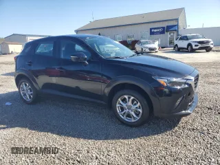2021 Mazda CX-3 Sport with VIN JM1DKDB74M1503916, listed as a Copart auction lot 52999295 with 11,567 mi miles and Salvage Title. Bid and sale history available at DreamBid. Image 4.