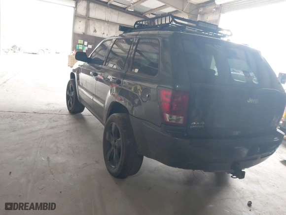 2006 Jeep Grand Cherokee Laredo with VIN 1J8GR48K76C280985, listed as a IAAI auction lot 42015127 with 257,358 mi miles. Bid and sale history available at carsss.com. Image 3.
