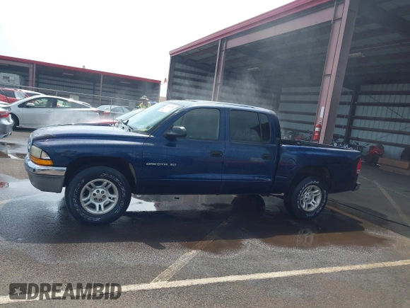 2001 Dodge Dakota Sport with VIN 1B7GL2AX01S133957, listed as a IAAI auction lot 41644558 with 156,008 mi miles. Bid and sale history available at carsss.com. Image 13.