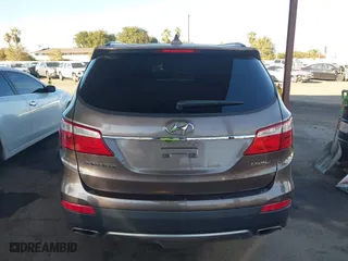 2014 Hyundai Santa Fe Limited with VIN KM8SN4HFXEU069526, listed as a IAAI auction lot 40768034 with 186,650 mi miles. Bid and sale history available at carsss.com. Image 16.