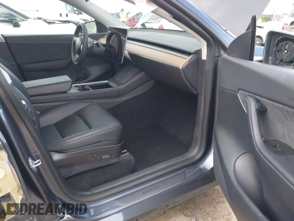 2022 Tesla Model Y Long Range with VIN 7SAYGAEE6NF341827, listed as a IAAI auction lot 41946388 with Not Provided miles and . Bid and sale history available at DreamBid. Image 5.