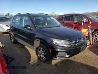 2016 Volkswagen Tiguan S with VIN WVGBV7AX7GW597813, listed as a Copart auction lot 88015075 with 73,544 mi miles and Salvage Title. Bid and sale history available at DreamBid. Image 4.