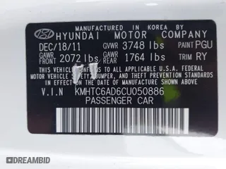 2012 Hyundai Veloster w/Gray Int with VIN KMHTC6AD6CU050886, listed as a IAAI auction lot 42088918 with 126,007 mi miles. Bid and sale history available at carsss.com. Image 9.