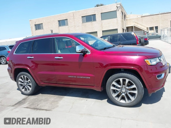 2017 Jeep Grand Cherokee Overland with VIN 1C4RJFCTXHC676236, listed as a IAAI auction lot 42164645 with 94,658 mi miles and . Bid and sale history available at DreamBid. Image 13.