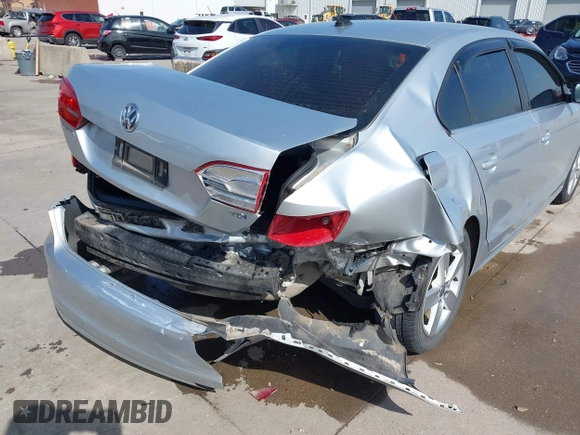 2014 Volkswagen Jetta TDI w/Premium with VIN 3VWLL7AJ6EM424935, listed as a IAAI auction lot 41533634 with 64,028 mi miles and . Bid and sale history available at DreamBid. Image 6.