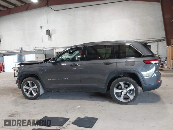 2022 Jeep Grand Cherokee with VIN 1C4RJYB65N8758560, listed as a IAAI auction lot 42182021 with 28,096 mi miles and . Bid and sale history available at DreamBid. Image 13.