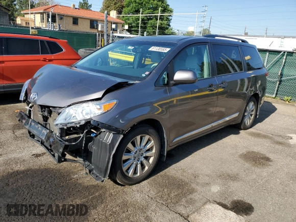 2014 Toyota Sienna Limited with VIN 5TDDK3DC8ES078175, listed as a Copart auction lot 61138585 with 98,527 mi miles and Salvage title. Bid and sale history available at DreamBid. Image 1.