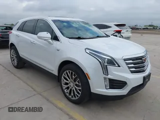 2017 Cadillac XT5 Luxury FWD z VIN 1GYKNBRS3HZ195197, wystawiony jako IAAI lot #42033419 z przebiegiem 76 709 mil mil oraz . Historia ofert i sprzedaży dostępna na DreamBid. Obrazek 1.