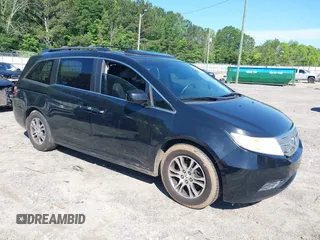 2011 Honda Odyssey EX-L with VIN 5FNRL5H67BB087064, listed as a IAAI auction lot 42326427 with 177,795 mi miles and . Bid and sale history available at DreamBid. Image 1.