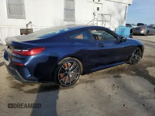 2021 BMW 8 Series 840i with VIN WBAAE4C08MCF60099, listed as a Copart auction lot 39080043 with 6,633 mi miles. Bid and sale history available at carsss.com. Image 3.