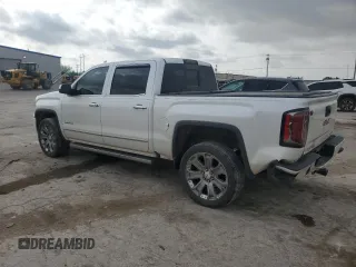 2017 GMC Sierra 1500 Denali with VIN 3GTU2PEJ6HG272209, listed as a Copart auction lot 53292975 with 106,499 mi miles and Salvage Title. Bid and sale history available at DreamBid. Image 2.